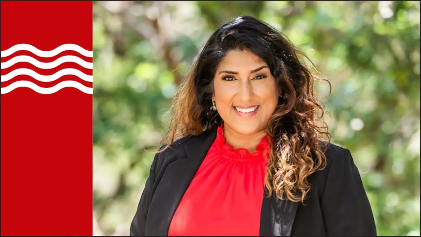 Indian American AI founder and Luminary Award winner, smiling.