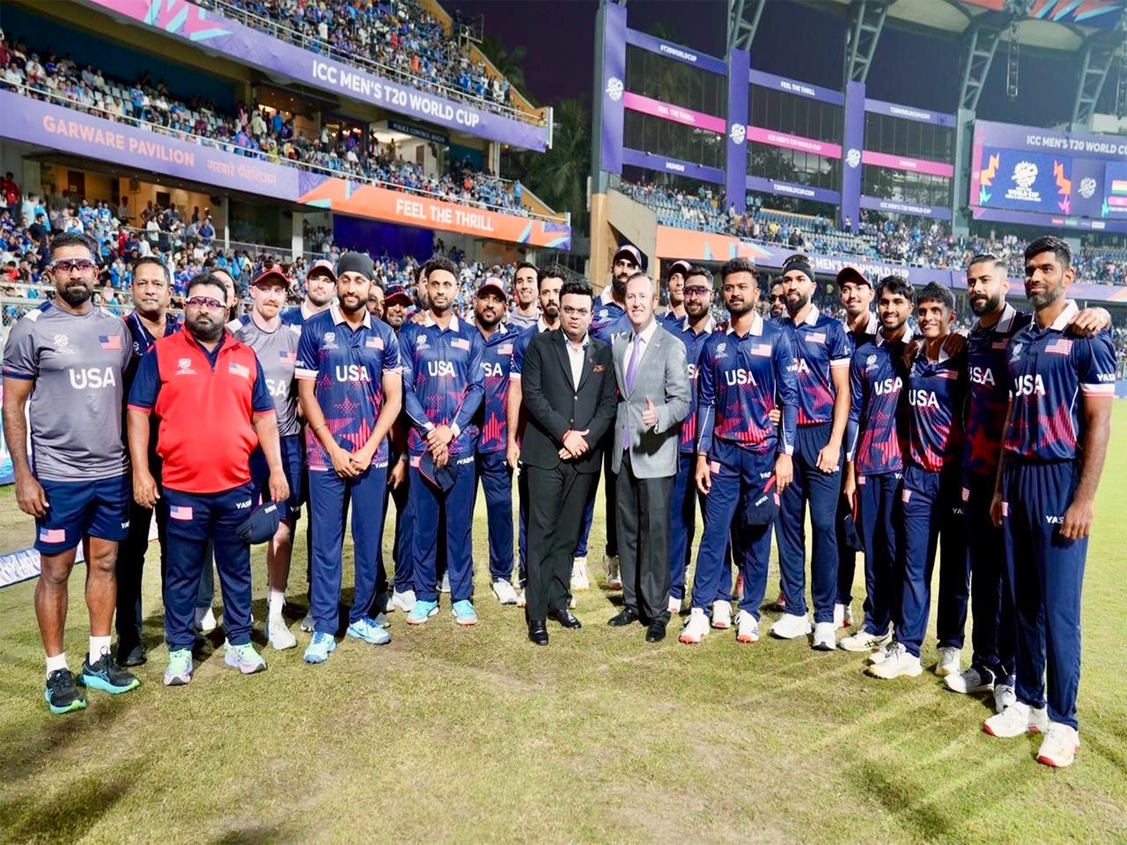USA cricket team poses with US envoy after India-USA T20 match.