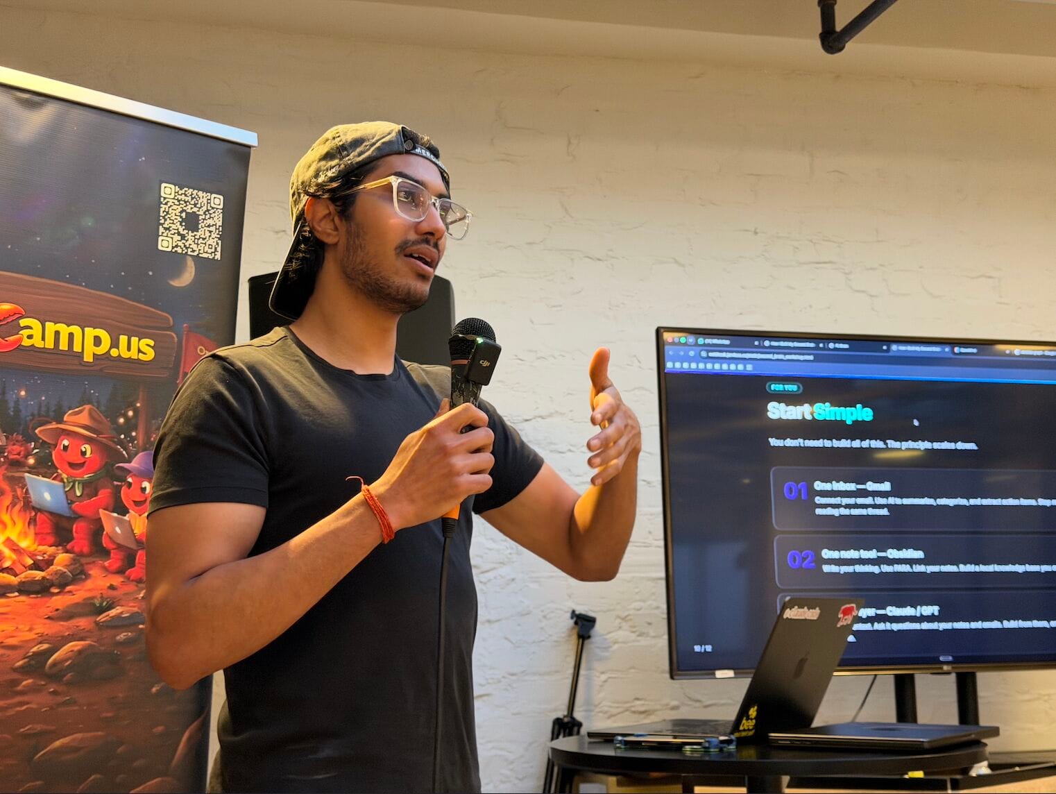 Indian-origin engineer presents AI startup concepts at tech event.