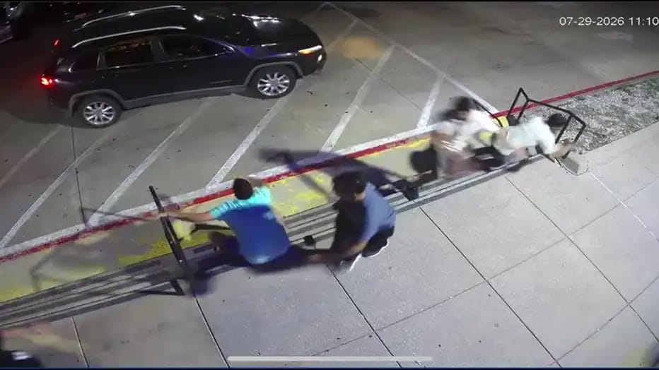 Dallas robbery warning: Surveillance footage shows individuals on a bench, with a car nearby.