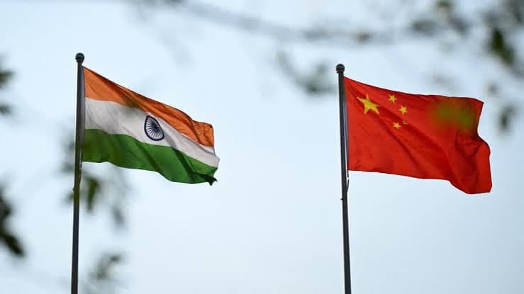 Indian and Chinese flags side-by-side, relevant to visa and immigration discussions.