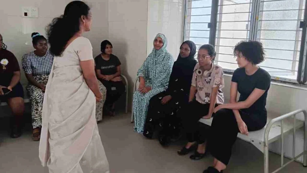 Osmania University foreign students in a classroom setting, possibly discussing politics.