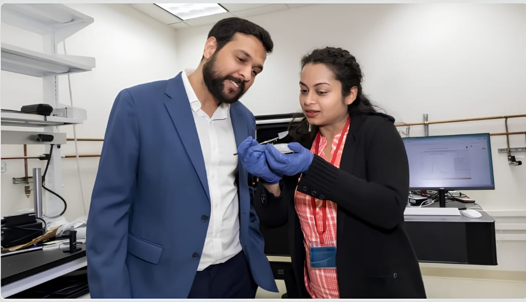 Indian American professors Pasayat and Gupta in a lab