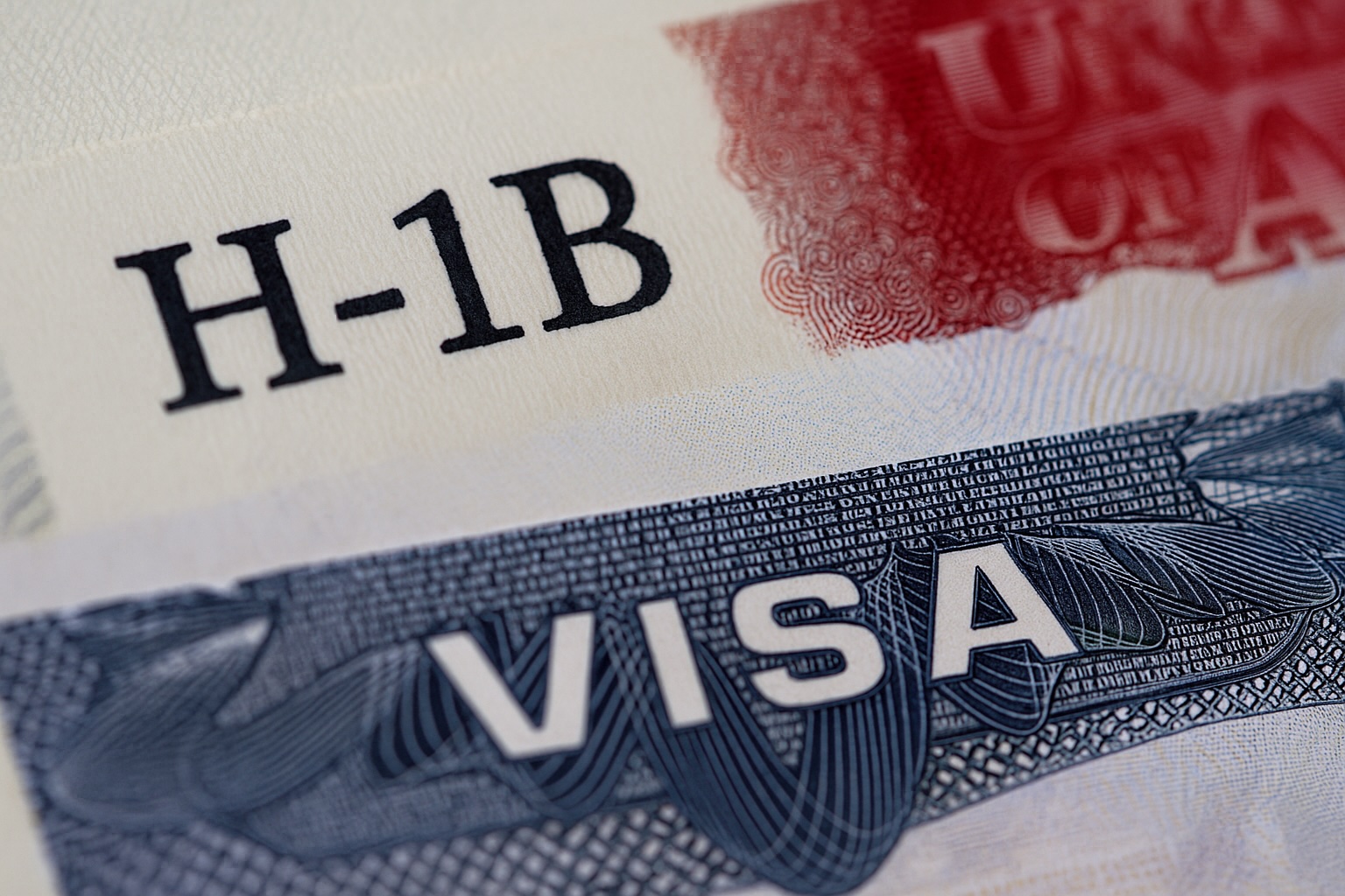 Close-up of H-1B visa stamp, representing US immigration for tech workers.