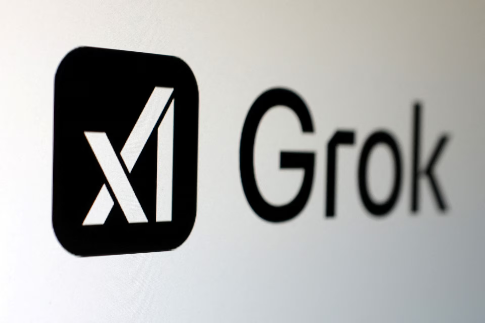 The Grok logo and text from Elon Musk's X, related to politics.