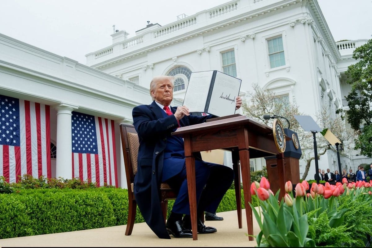 Donald Trump signs legislation on White House lawn, politics