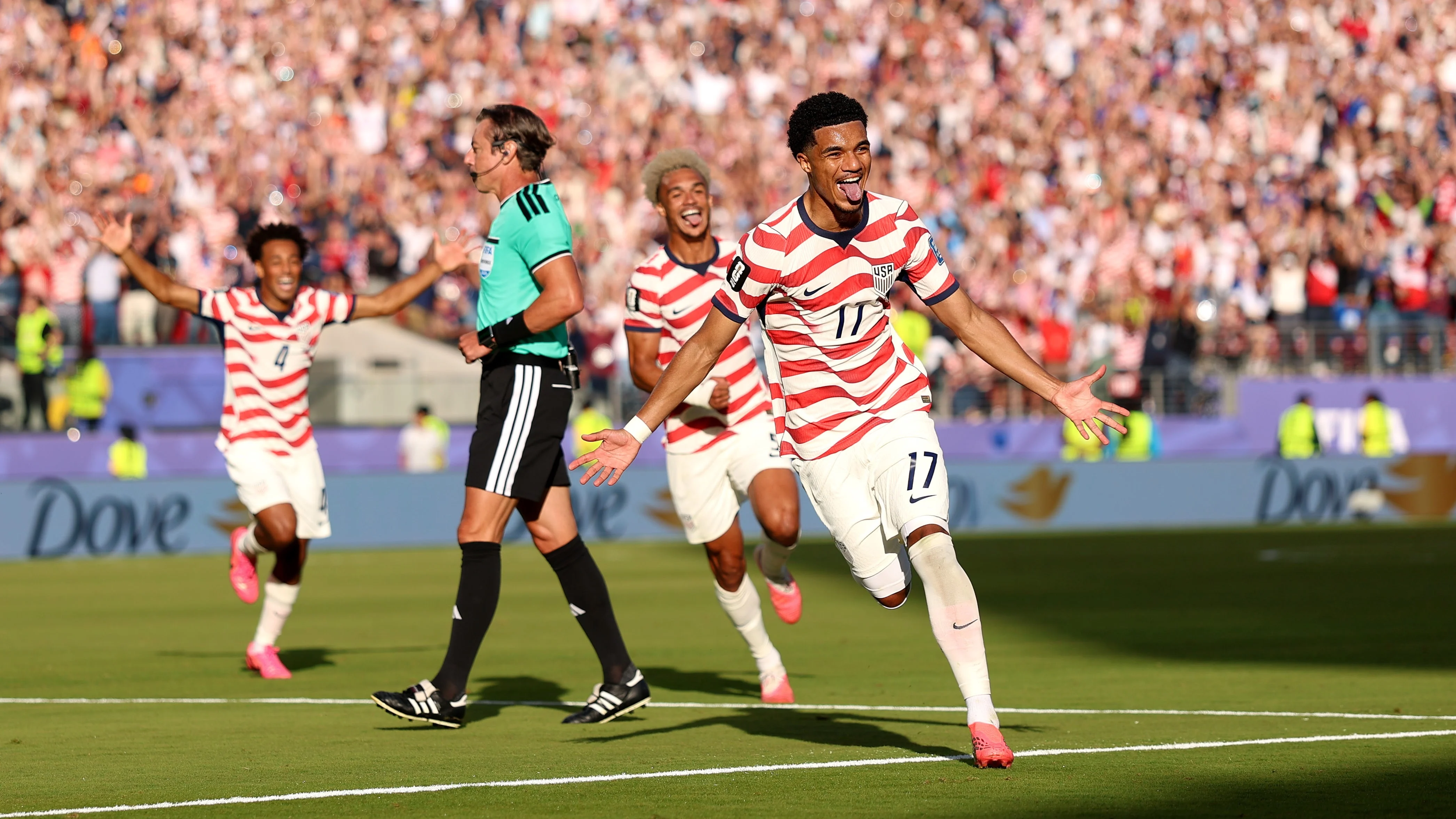 USMNT player celebrates a goal against Belgium during a 2026 World Cup qualifier.