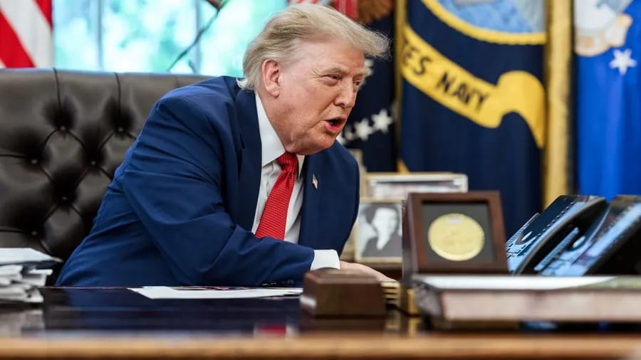 Donald Trump in the Oval Office, discussing politics and the SAVE Act.