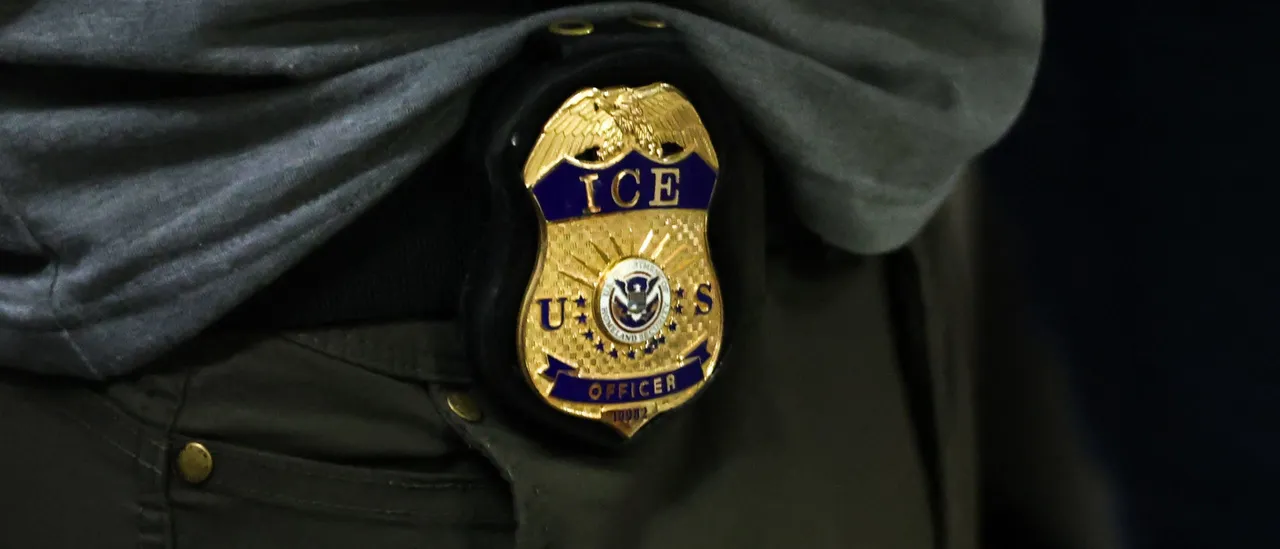 ICE officer badge on uniform, relevant to visa and immigration blog post