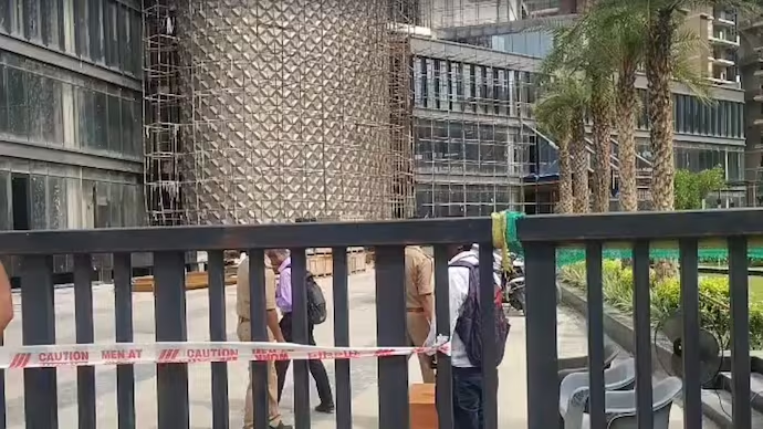 Police at UP mall construction site where a girl's body was found.