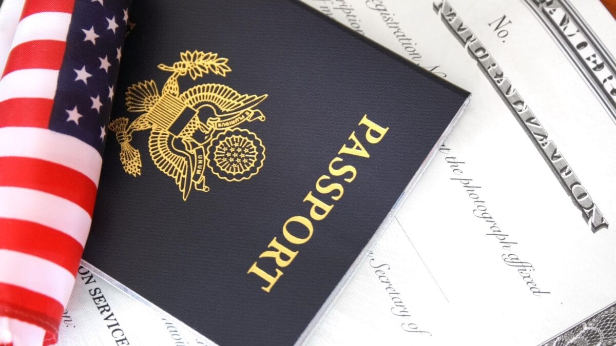 US passport and flag, related to visa and immigration issues.