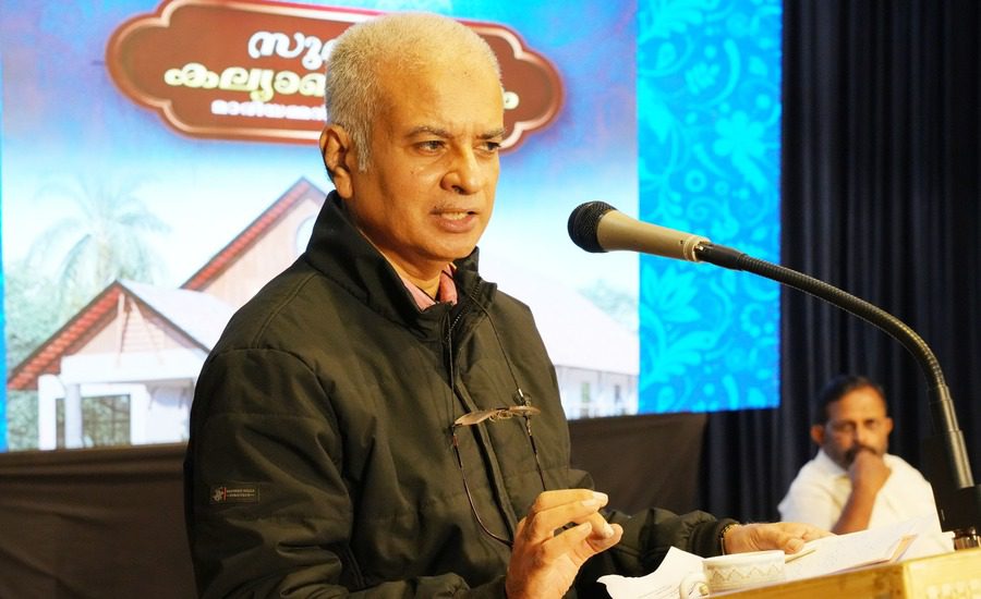 Dr. Raju Narayana Swamy, an Indian bureaucrat, speaks at an event, releasing his 37th book.