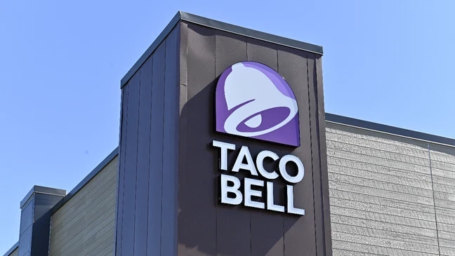 Taco Bell restaurant exterior with prominent logo, relevant to politics and food safety news.
